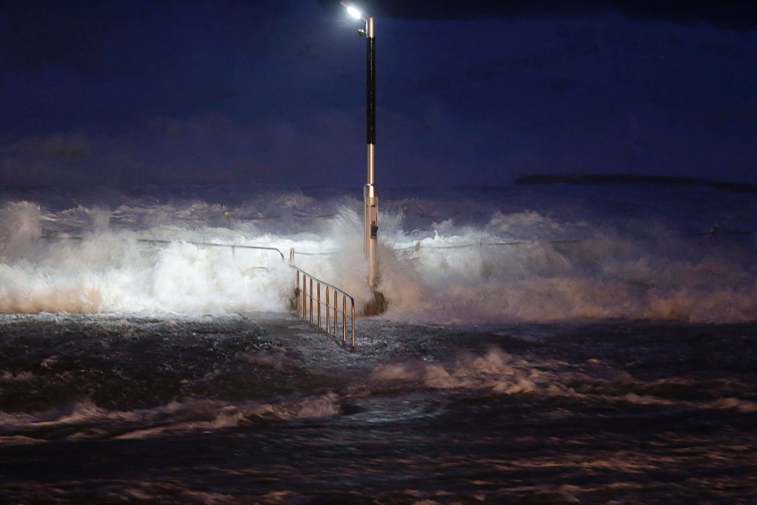 PHOTO: Huge waves crash over swimming baths at Avalon Beach in Sydney, Australia, April 21, 2015. 