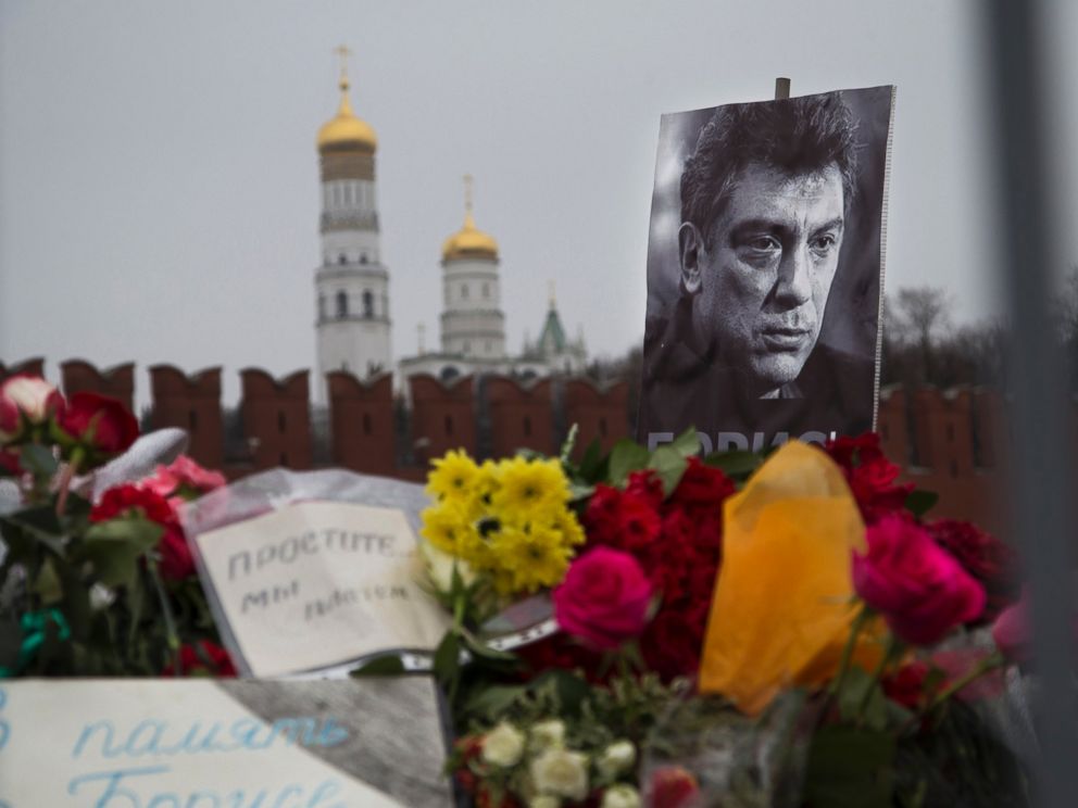 PHOTO: Flowers and a condolence message that reads In memory of Boris are placed with a portrait of Boris Nemtsov, at the site where Nemtsov was gunned down near the Kremlin, in Moscow, Russia, Monday, March 2, 2015.
