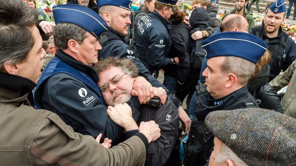 PHOTO: Police detain a person at the Place de la Bourse in Brussels, Belgium, April 2, 2016. 