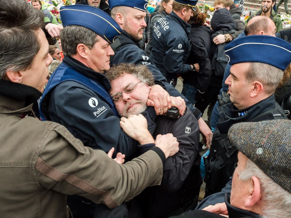 PHOTO: Police detain a person at the Place de la Bourse in Brussels, Belgium, April 2, 2016.