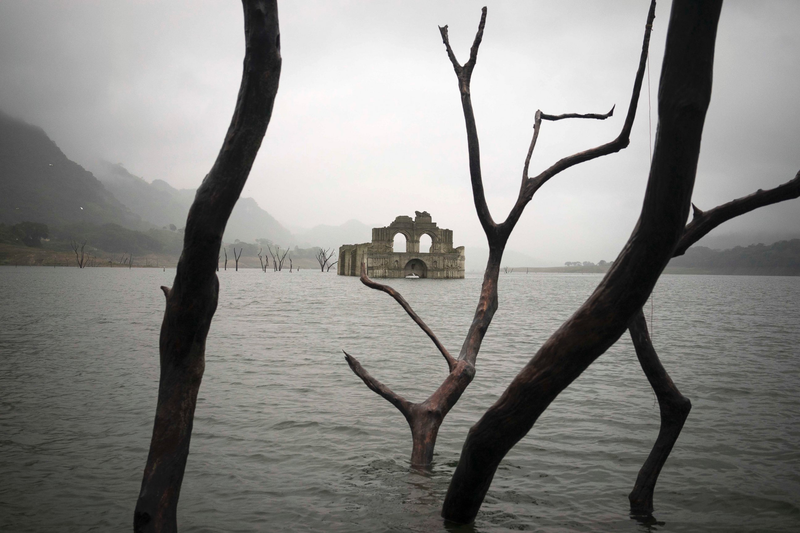 PHOTO: The remains of a mid-16th century church known as the Temple of Santiago, as well as the Temple of Quechula, is visible from the surface of the Grijalva River in Chiapas state, Mexico, Oct. 16, 2015. 