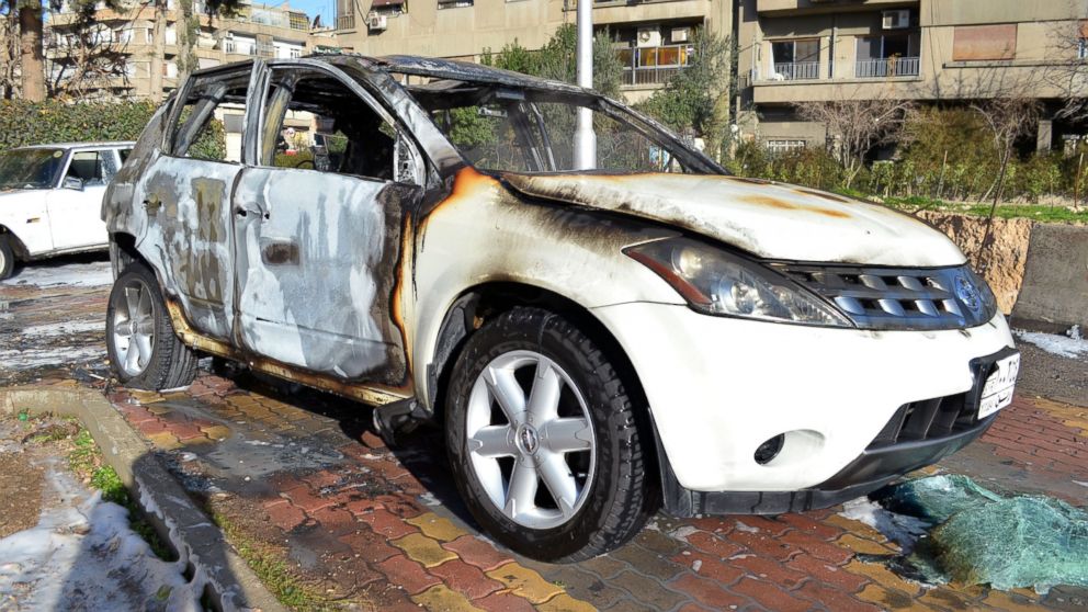 A car is seen here that was burned after rebels fired rockets and mortar shells in the capital Damascus, Syria on Feb. 5, 2015.