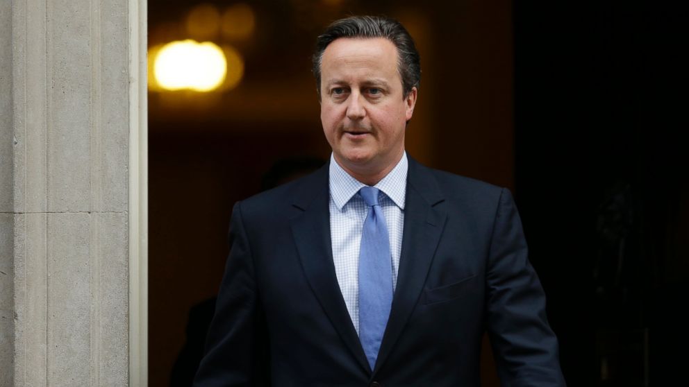British Prime Minister David Cameron leaves 10 Downing Street in London, to go to the Houses of Parliament for a debate and vote on launching airstrikes against Islamic State extremists inside Syria, Dec. 2, 2015.