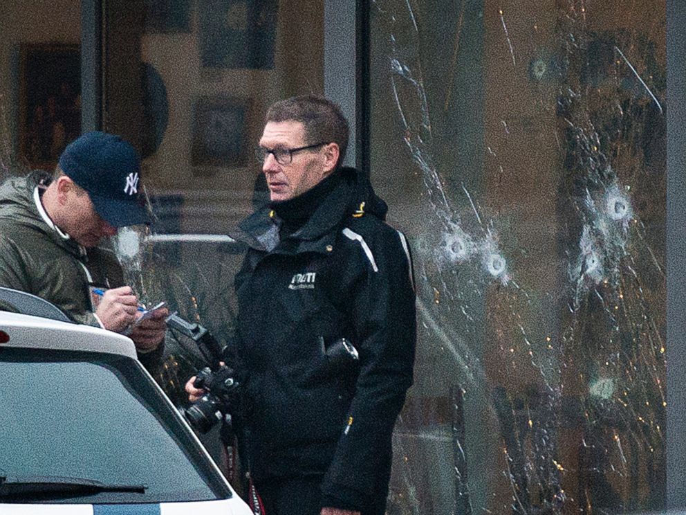 PHOTO: The scene outside the Copenhagen cafe, with bullet marked window, where a gunman opened fire Saturday, Feb. 14, 2015.
