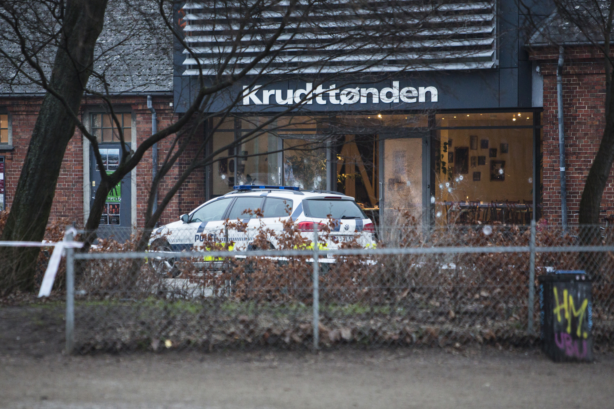 PHOTO: The scene outside the Copenhagen cafe, with bullet marked window, where a gunman opened fire Saturday, Feb. 14, 2015,.