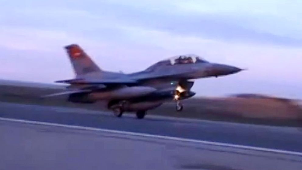 In this video image released by the Egyptian Defense Ministry, an Egyptian fighter jet lands in Egypt, Feb. 16, 2015.