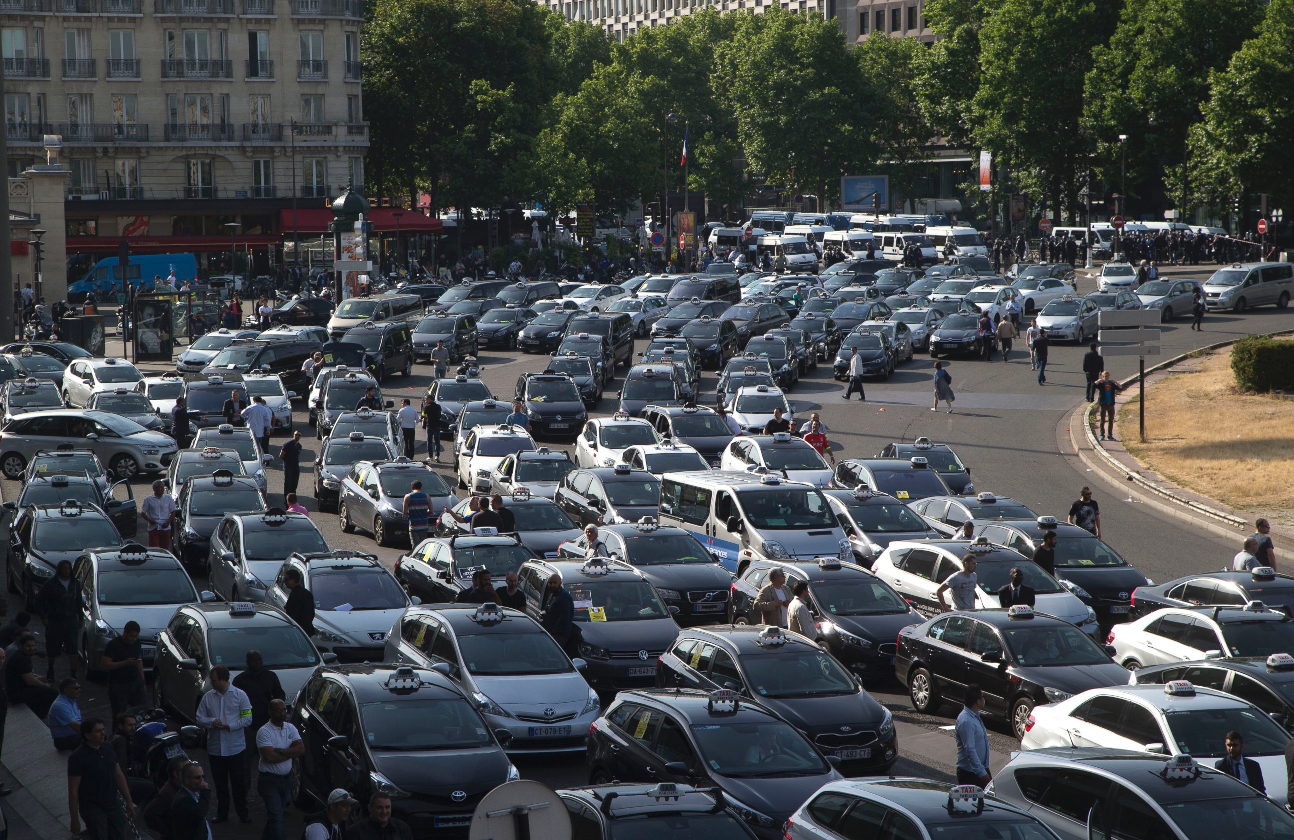 PHOTO: Taxis gather at a major entrance of Paris, June 25, 2015, in Paris. 