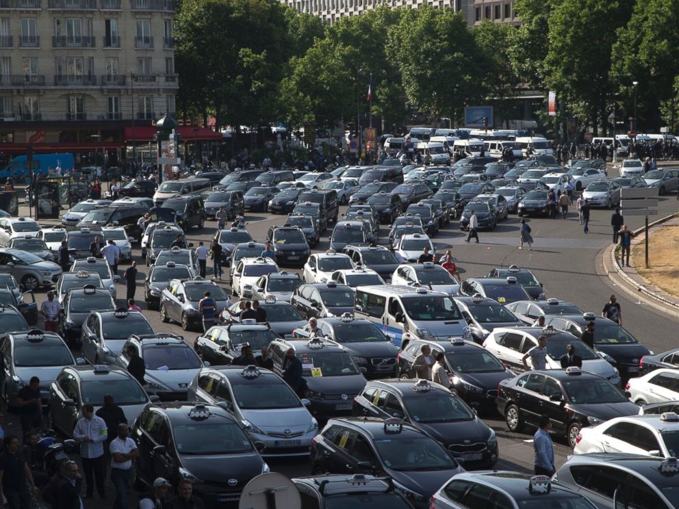 PHOTO: Taxis gather at a major entrance of Paris, June 25, 2015, in Paris.