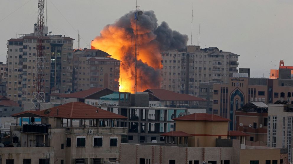 A ball of fire rises from an explosion on al-Zafer apartment tower following an Israeli air strike in Gaza City, in the northern Gaza Strip, Aug. 23, 2014.