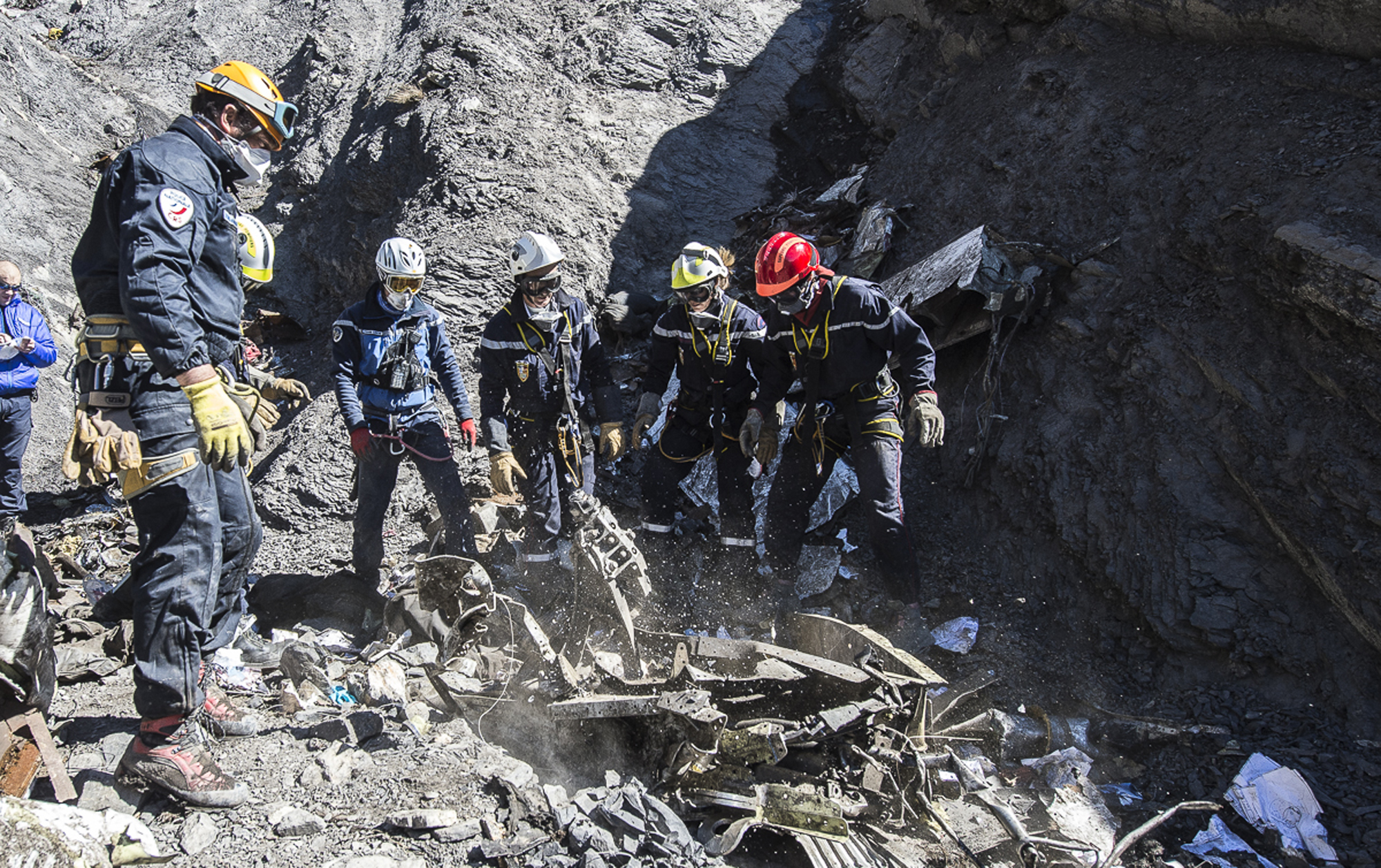 PHOTO: French emergency rescue services work among debris of the Germanwings passenger jet at the crash site near Seyne-les-Alpes, France in this March 31, 2015 file photo.