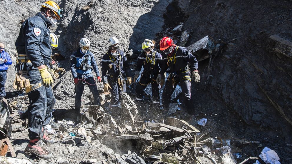 PHOTO: French emergency rescue services work among debris of the Germanwings passenger jet at the crash site near Seyne-les-Alpes, France, March 31, 2015.
