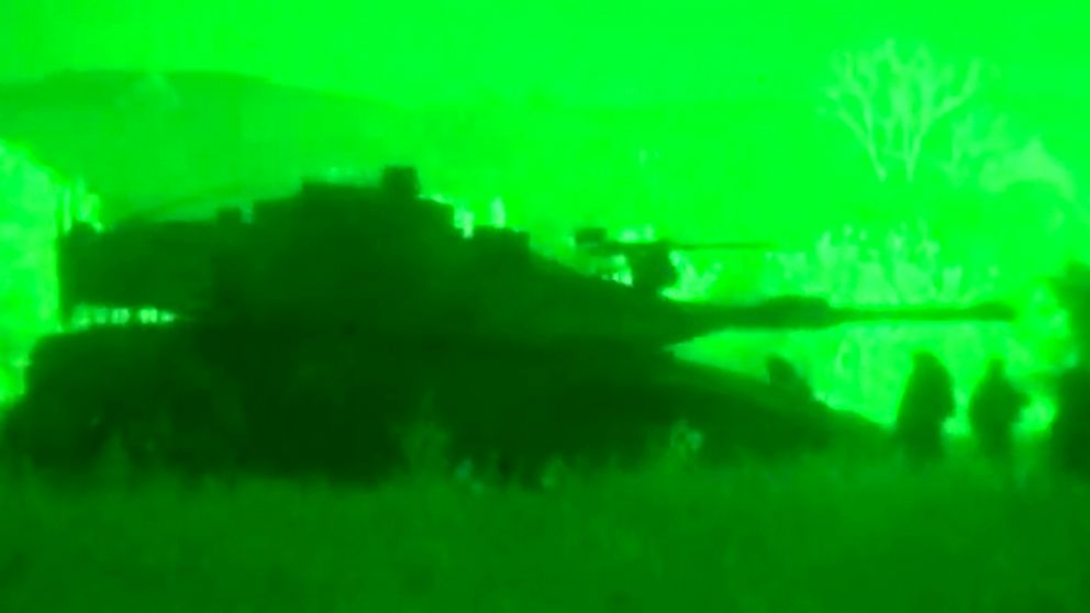 PHOTO: This image made from video shot through a night vision scope released by the Israeli military, July 18, 2014, shows a tank in the Gaza Strip during a ground offensive.
