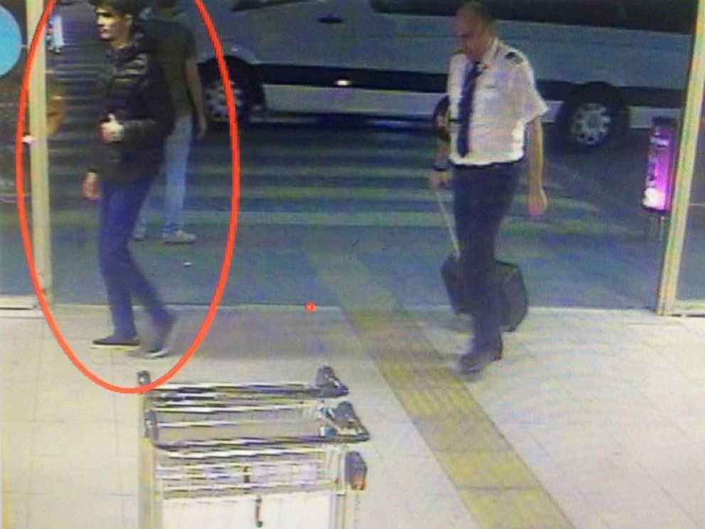 PHOTO: In this framegrab from CCTV video, made available by the Turkish Haberturk newspaper on Thursday, June 30, 2016, a man, at left circled, believed to be one of the attackers walks in Istanbul's Ataturk airport, Tuesday June 28, 2016. 