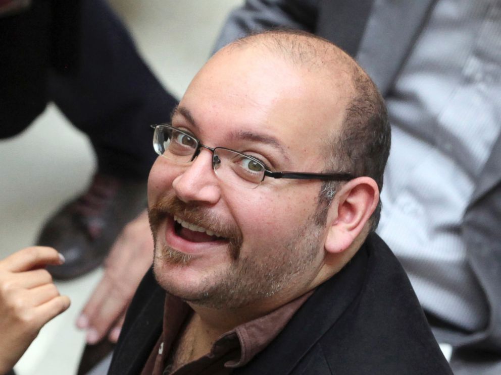 PHOTO: In this photo April 11, 2013 file photo, Jason Rezaian, an Iranian-American correspondent for the Washington Post, smiles as he attends a presidential campaign of President Hassan Rouhani, in Tehran, Iran. 