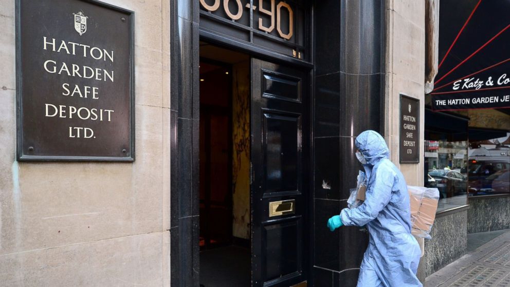 A police forensics officer is pictured entering the Hatton Garden Safe Deposit company in London on April, 7, 2015.