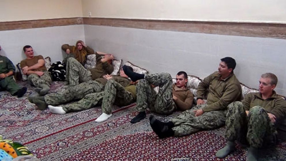 This picture released by the Iranian Revolutionary Guards, Jan. 13, 2016, shows detained American Navy sailors in an undisclosed location in Iran. 