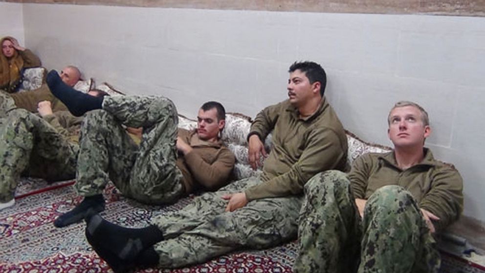 This picture released by the Iranian Revolutionary Guards, Jan. 13, 2016, shows detained American Navy sailors in an undisclosed location in Iran.