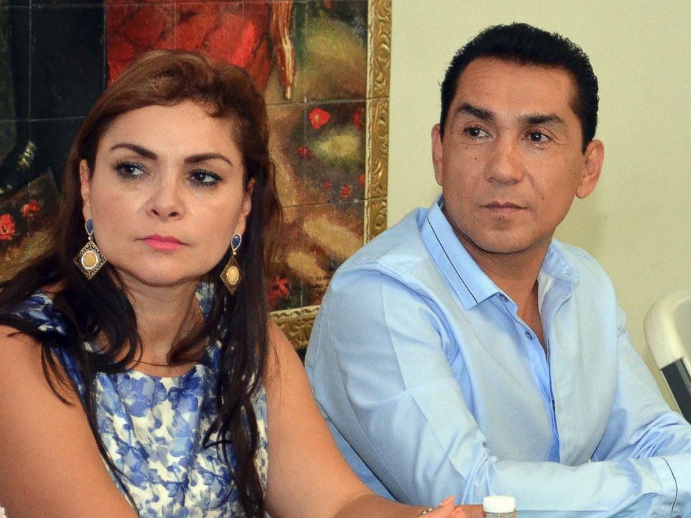 PHOTO: In this May 8, 2014 file photo, the mayor of the city of Iguala, Jose Luis Abarca, right, and his wife Maria de los Angeles Pineda Villa meet with state government officials in Chilpancingo, Mexico.