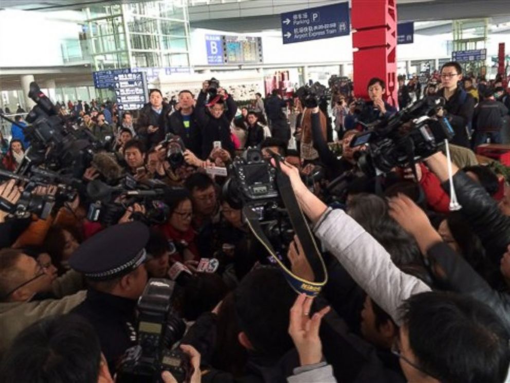 PHOTO: In this photo released by Chinas Xinhua News Agency, reporters crowd at Terminal 3 of Beijing Capital International Airport March 8, 2014 following a report that a Malaysia Airlines plane lost contact on a flight from Kuala Lumpur to Beijing.