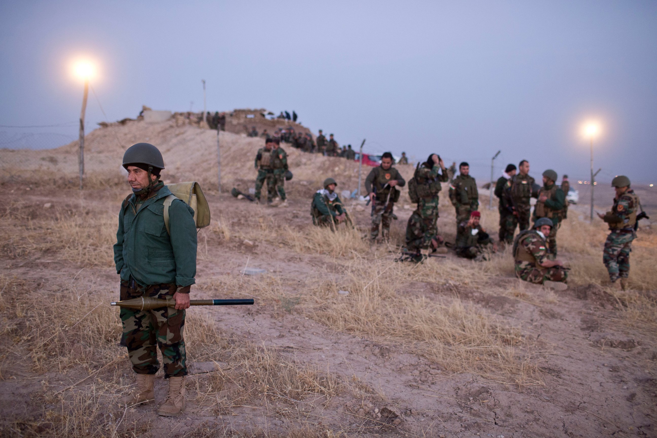 PHOTO: Kurdish peshmerga forces gather prior to opening up a front against the Islamic state in Nawaran, some 20 kilometers (13 miles) northeast of Mosul, Iraq, Oct. 20, 2016