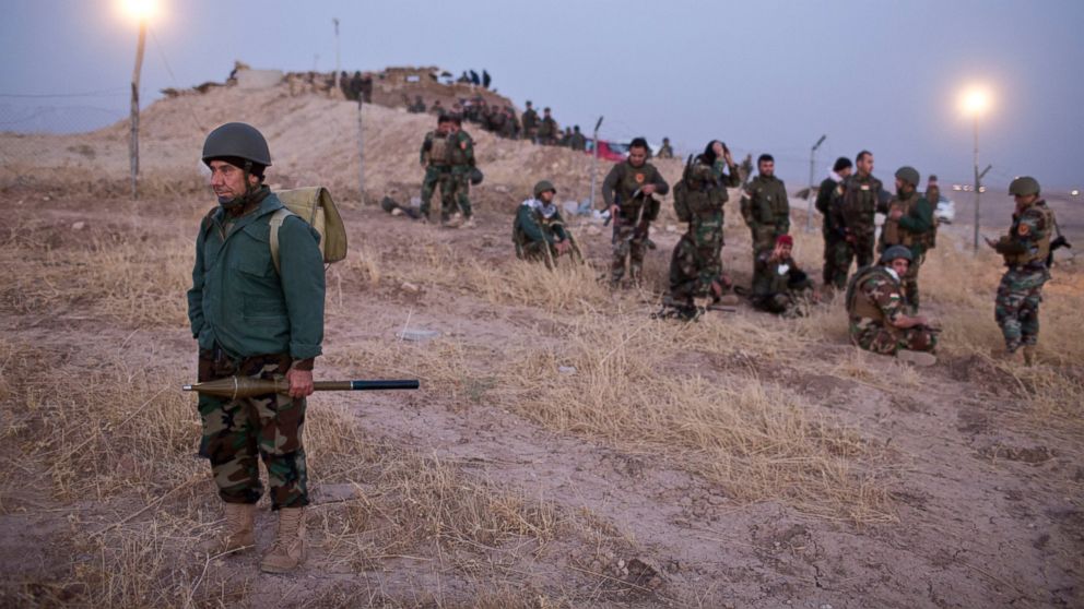 PHOTO: Kurdish peshmerga forces gather prior to opening up a front against the Islamic state in Nawaran, some 20 kilometers (13 miles) northeast of Mosul, Iraq, Oct. 20, 2016