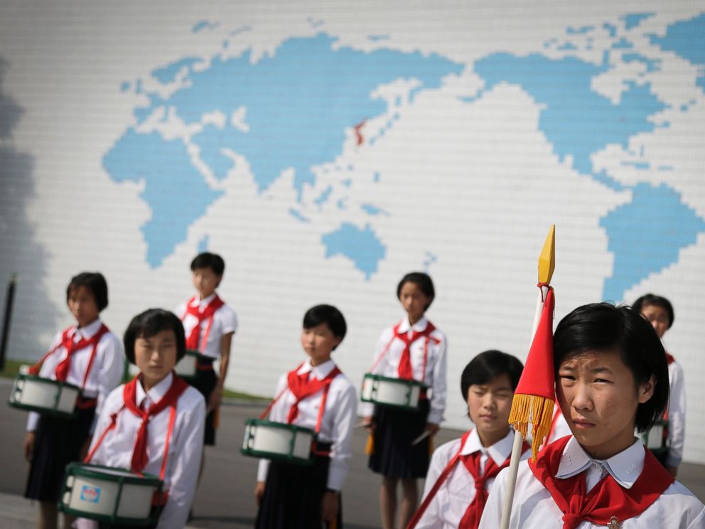 PHOTO: North Korean school girls stand in formation during an opening ceremony for the start of summer activities at the Songdowon International Childrens Camp, July 29, 2014, in Wonsan, North Korea.