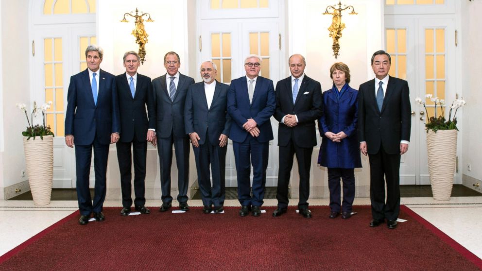 Secretary of State John Kerry, along with the foreign ministers from Britain, Russia, Iran, Germany, France, China and the EU, pose for a group photo during their meeting in Vienna, Nov. 24, 2014.