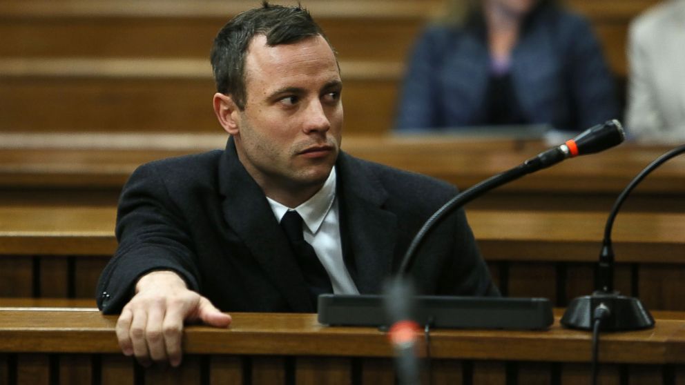 Oscar Pistorius attends court at his murder trial for the shooting death of his girlfriend Reeva Steenkamp on St. Valentine's Day 2013 in Pretoria, South Africa, July 8, 2014.