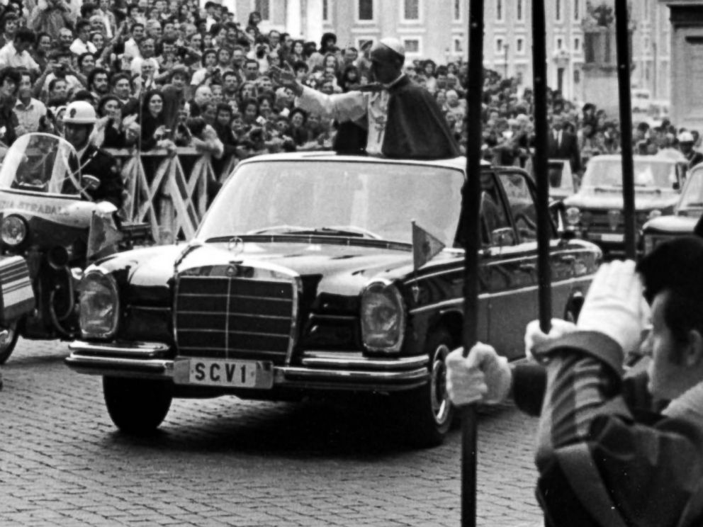 PHOTO: Swiss Guards salute Pope Paul VI as he waves to crowds in Vatican City on Sept. 21, 1972.