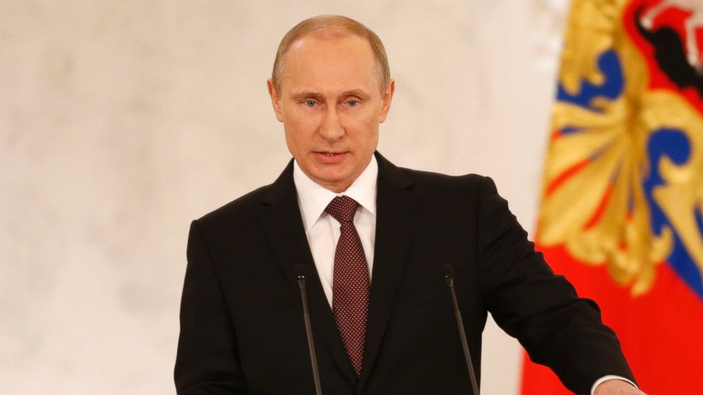 Russia's President Vladimir Putin addresses the Federation Council in Moscow's Kremlin, March 18, 2014.