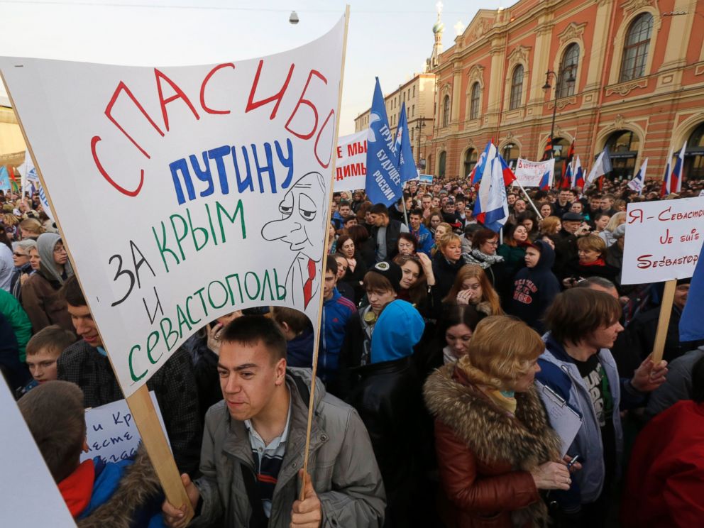 PHOTO: Demonstrators gather for a concert marking the one year anniversary of the annexation of Ukraines Crimea peninsula in St.Petersburg, Russia, March 18, 2015.