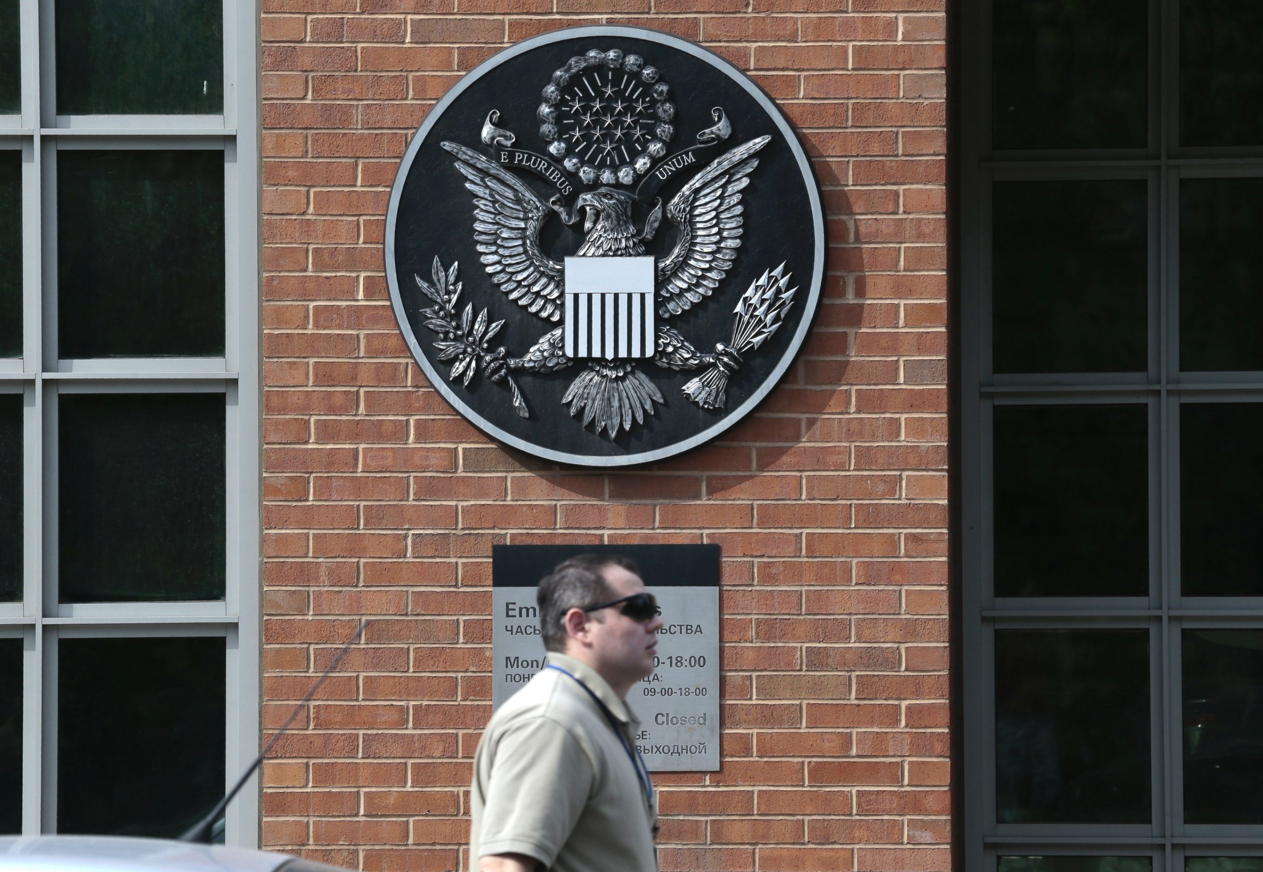 PHOTO: A man passes an entrance of the U.S. Embassy in downtown Moscow, Russia, on Tuesday, May 14, 2013.