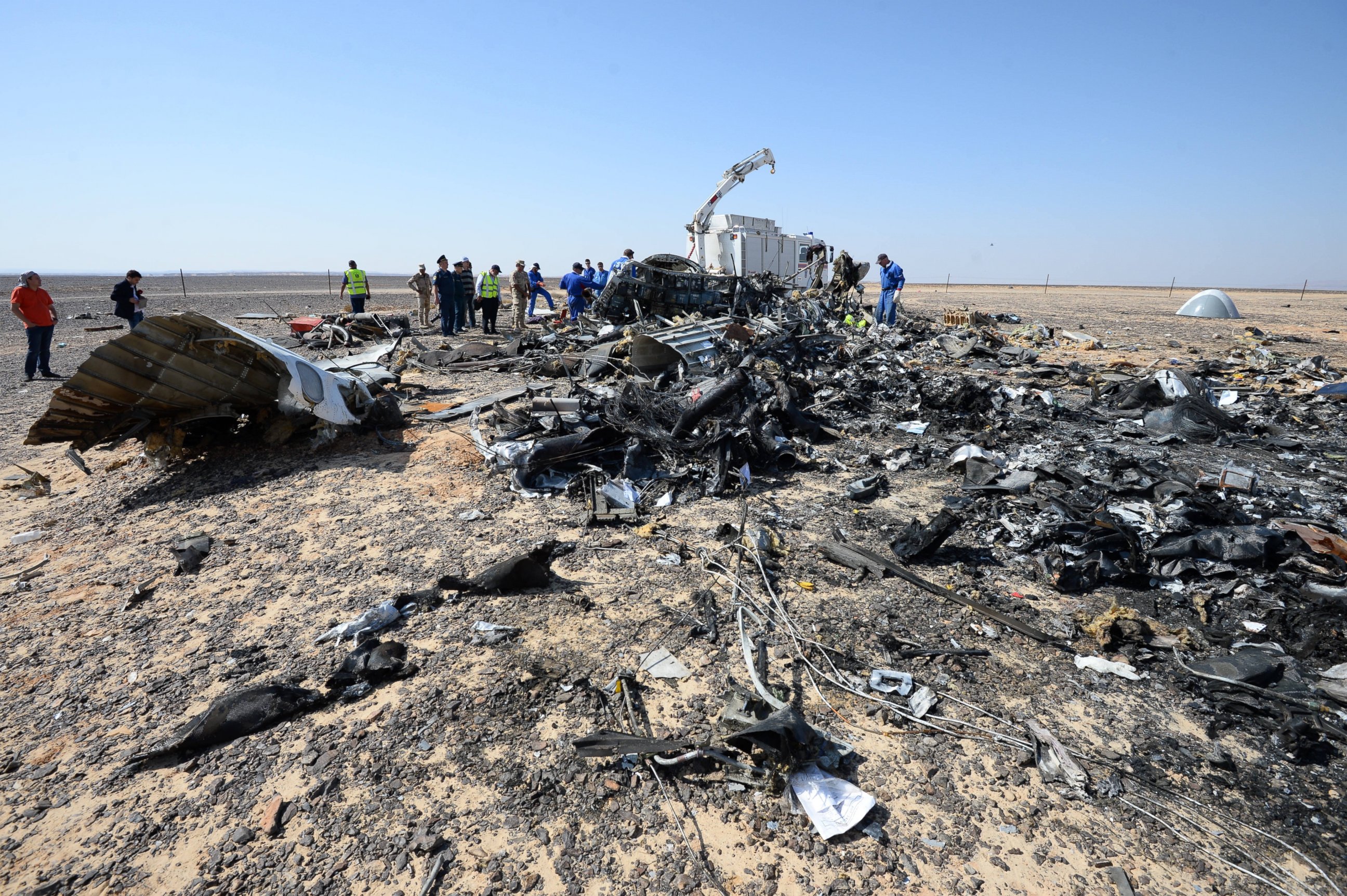 PHOTO: Russian and Egyptian experts work at the crash site of a Russian passenger plane bound for St. Petersburg in Russia that crashed in Hassana, Egypt's Sinai Peninsula, Nov. 2, 2015. 
