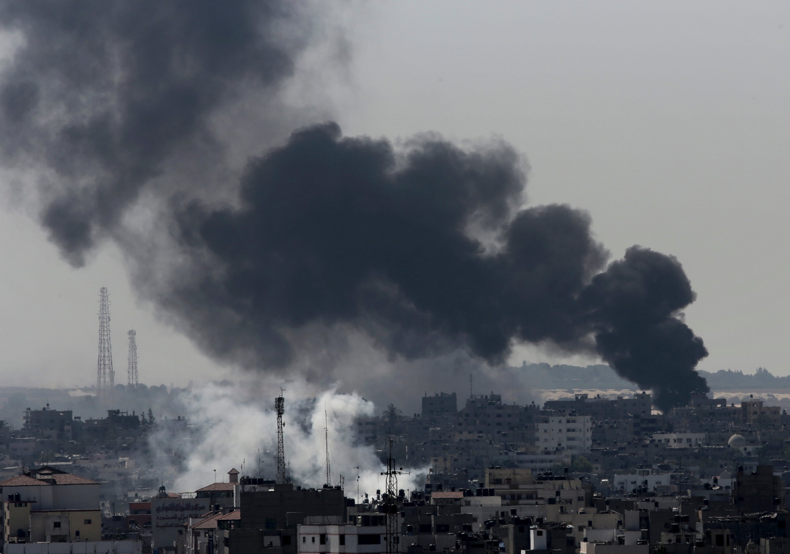 PHOTO: Smoke from Israeli strikes rises over Gaza City, in the northern Gaza Strip, Sunday, July 27, 2014. Israel resumed its Gaza offensive on Sunday, calling off a unilateral extension of a cease-fire after Palestinian militants fired rockets at Israel.