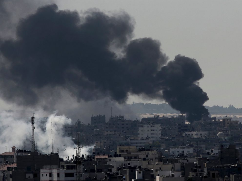 PHOTO: Smoke from Israeli strikes rises over Gaza City, in the northern Gaza Strip, Sunday, July 27, 2014. Israel resumed its Gaza offensive on Sunday, calling off a unilateral extension of a cease-fire after Palestinian militants fired rockets at Israel.