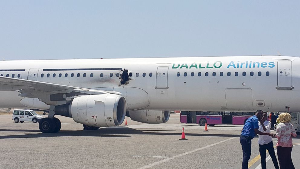 PHOTO:A hole is seen in a plane operated by Daallo Airlines as it sits on the runway of the airport in Mogadishu, Somalia, Feb. 2, 2016.   