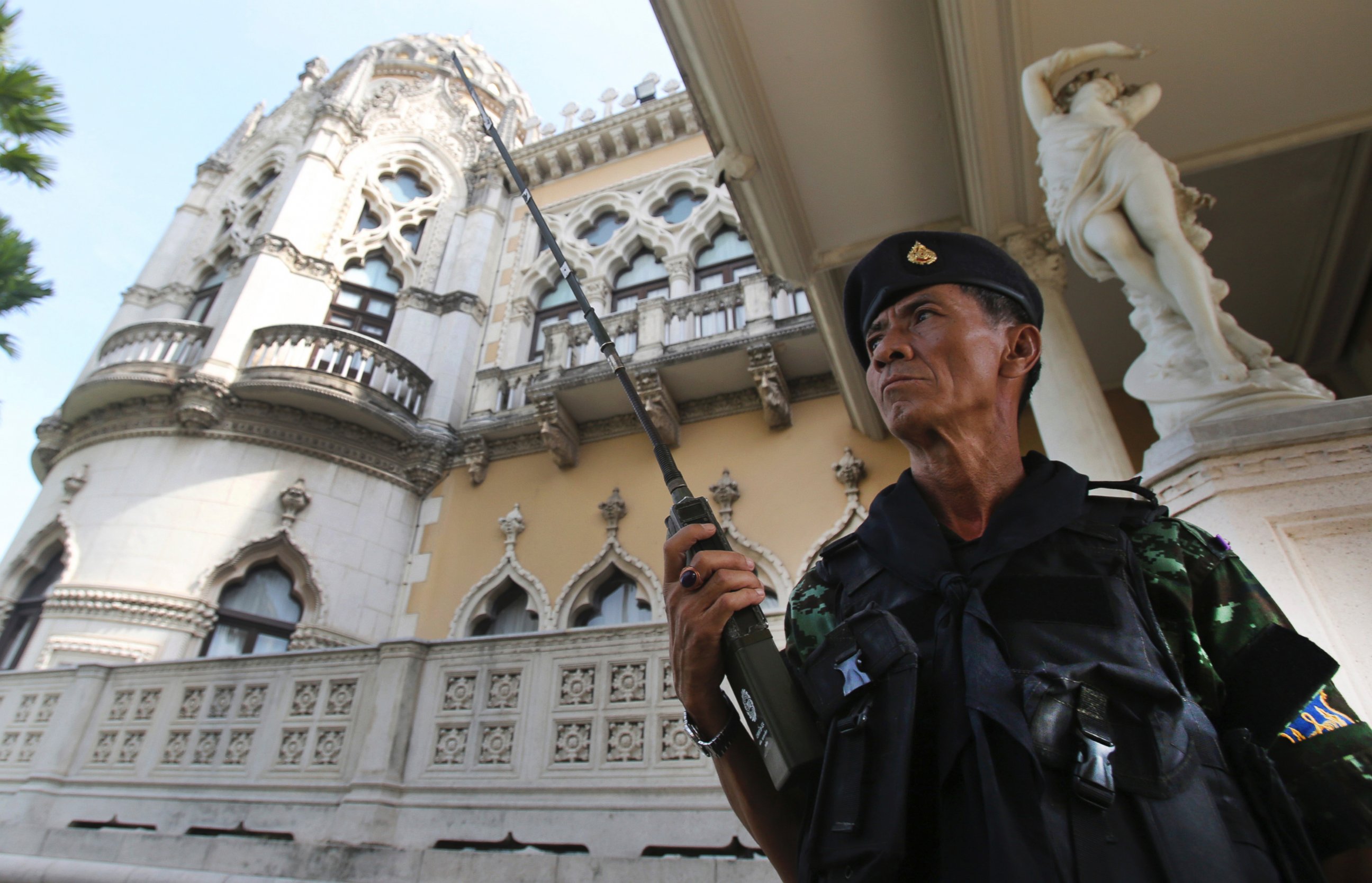 PHOTO: A Thai soldier guards outside Government House compound of prime minister's office,in Bangkok, Thailand, Tuesday, May 20, 2014. 