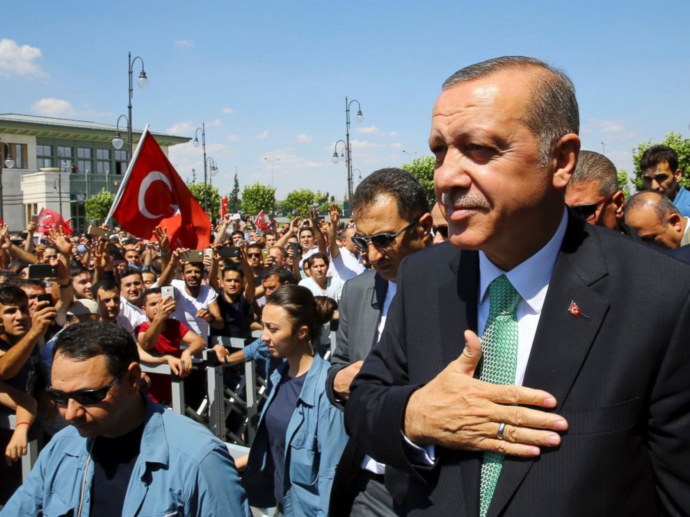 PHOTO: Turkeys President Recep Tayyip Erdogan, acknowledges the crowd as he arrives at the parliament in Ankara, Turkey, July 22, 2016.