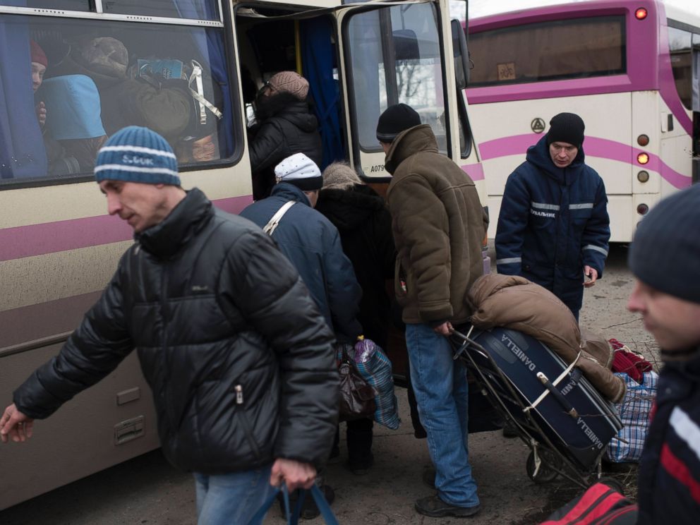PHOTO: Civilians board a bus near Artemivsk, eastern Ukraine, Feb. 5, 2015, as people are evacuated from Debaltseve.