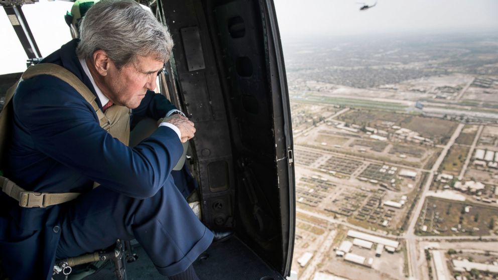 PHOTO: U.S. Secretary of State John Kerry looks out from a helicopter over Baghdad, Sept. 10, 2014. 