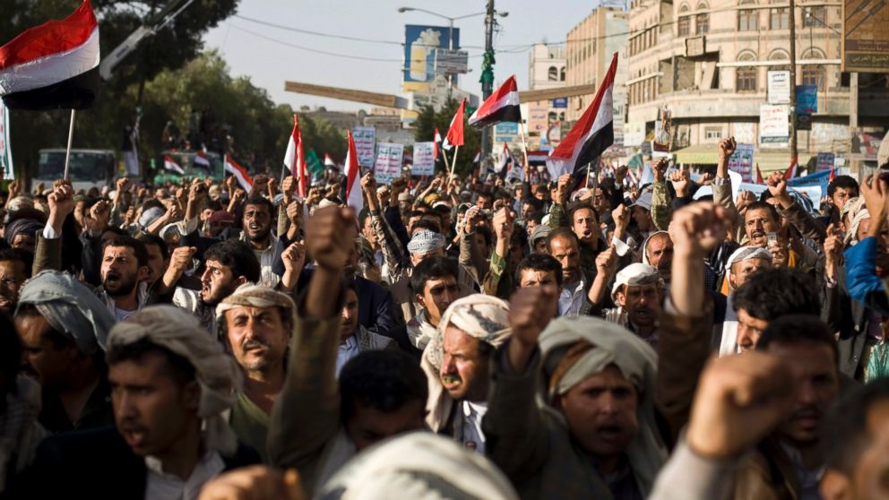 PHOTO: Supporters of Houthi Shiites shout slogans while marching on a street as they celebrate the fourth anniversary of the uprising in Sanaa, Yemen, Feb. 11, 2015.