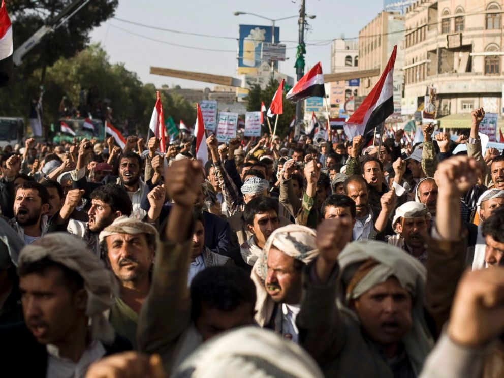 PHOTO: Supporters of Houthi Shiites shout slogans while marching on a street as they celebrate the fourth anniversary of the uprising in Sanaa, Yemen, Feb. 11, 2015.