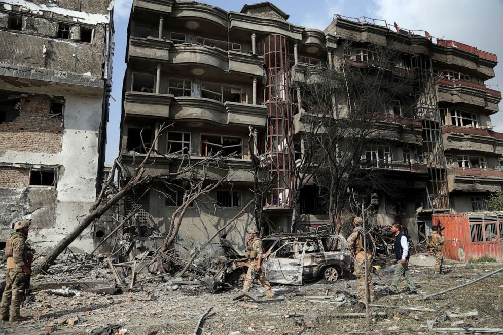 PHOTO: Afghan security forces inspect the aftermath of Sunday's attack in Kabul, Afghanistan, Monday, July 29, 2019.