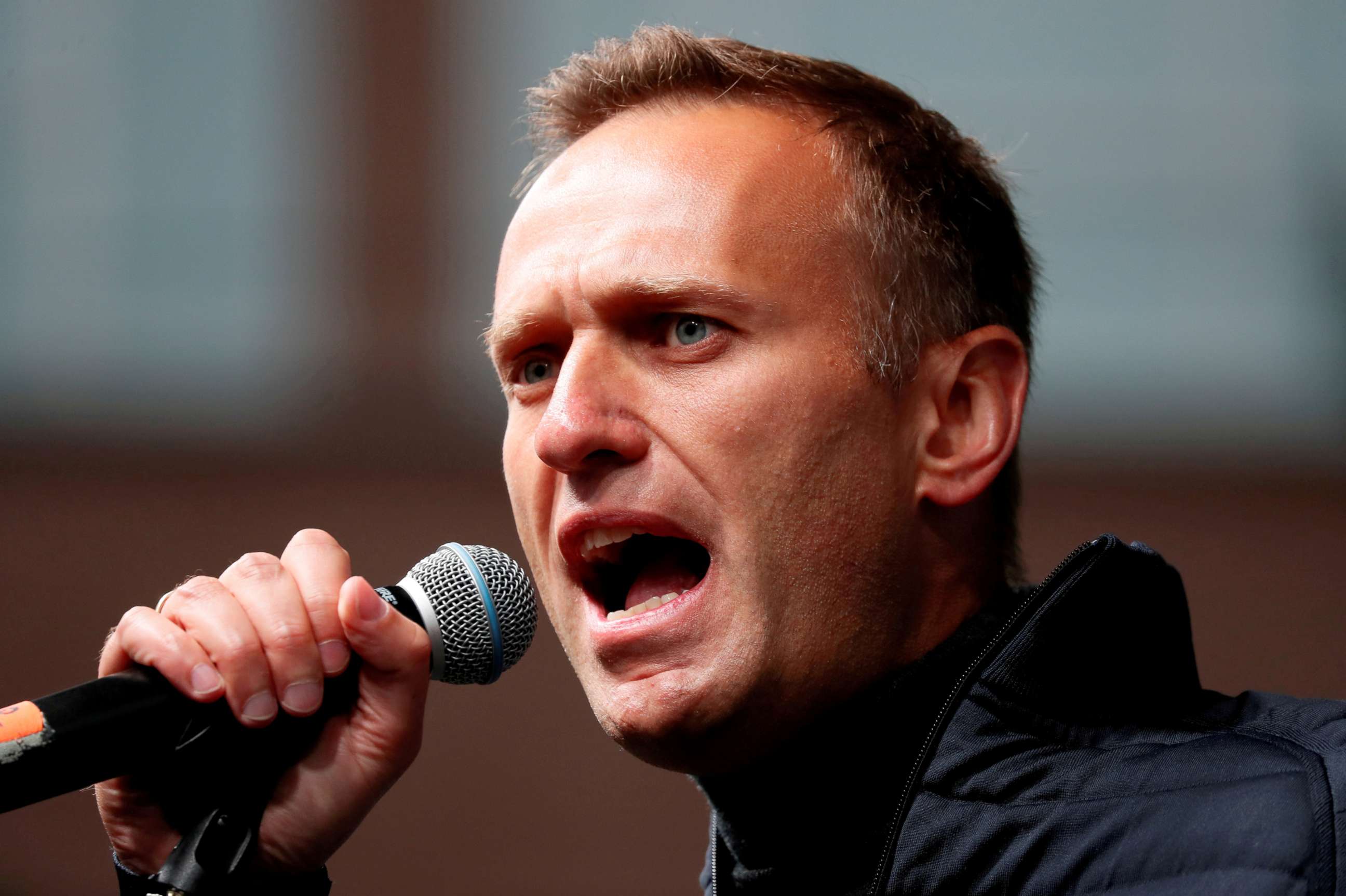 FILE PHOTO: Russian opposition leader Alexei Navalny delivers a speech during a rally to demand the release of jailed protesters, who were detained during opposition demonstrations for fair elections, in Moscow on Sept. 29, 2019.