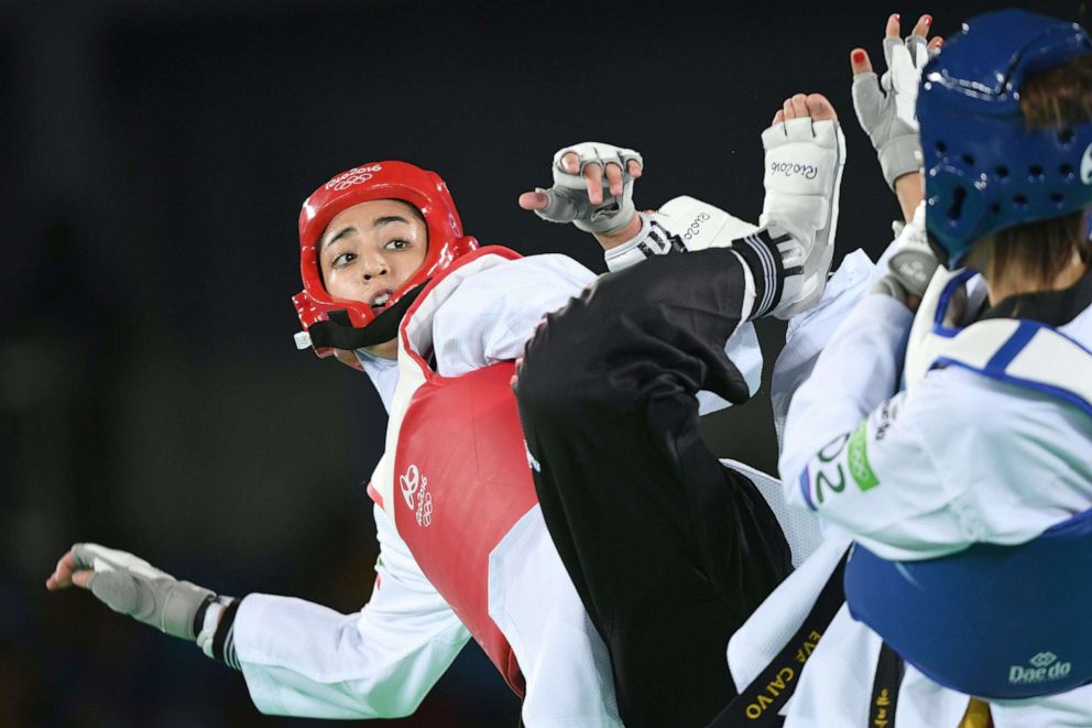 PHOTO: Iran's Kimia Alizadeh Zenoorin competes against Spain's Eva Calvo Gomez during the women's taekwondo quarter-final at the Rio 2016 Olympic Games, Aug. 18, 2016, in Rio de Janeiro, Brazil.