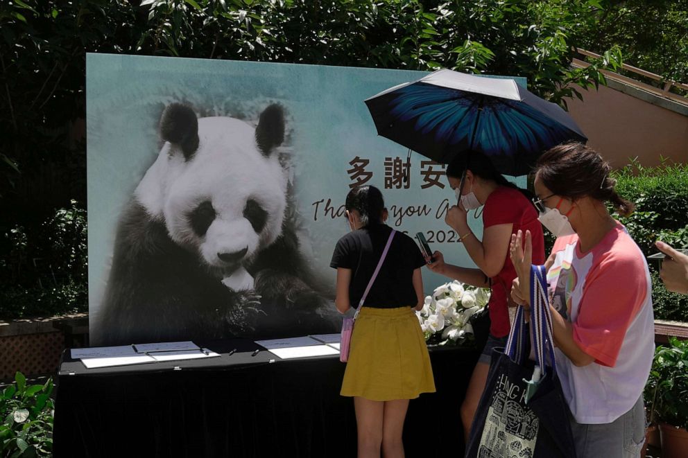 PHOTO: Visitors write notes to mourn the death of Chinese giant panda An An at the Ocean Park of Hong Kong, Thursday, July 21, 2022. The oldest-ever male giant panda in captivity has died at age 35 at the Hong Kong theme park after his health failed. 