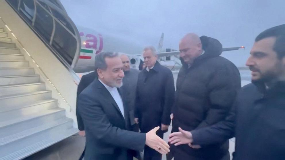 PHOTO: Iran's Foreign Minister Abbas Araghchi is greeted by officials during his visit to Russia in St. Petersburg on April 27, 2026.