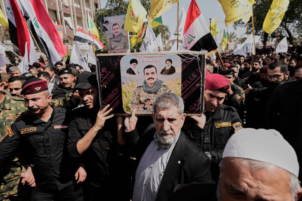 PHOTO: Members from the Popular Mobilization Forces attend a funeral of their colleague in Sadr city in Baghdad, on March 28, 2026.