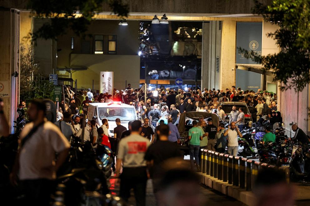 People gather outside American University of Beirut Medical Center (AUBMC) in Beirut, Lebanon September 17, 2024. REUTERS/Mohamed Azakir