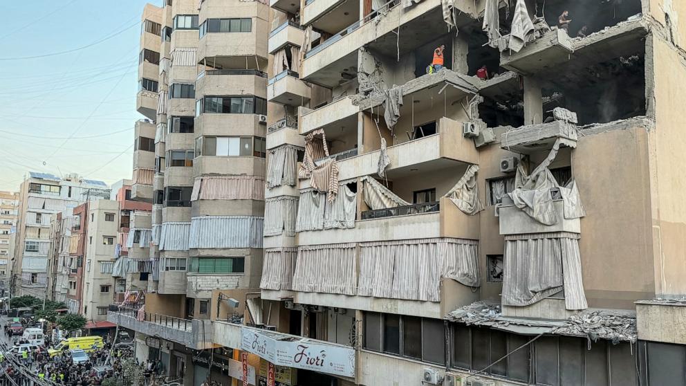 PHOTO: Workers clean the rubble from the site of an Israeli attack that targeted a residential building in Beirut's southern Haret Hreik neighborhood on Nov. 23, 2025.